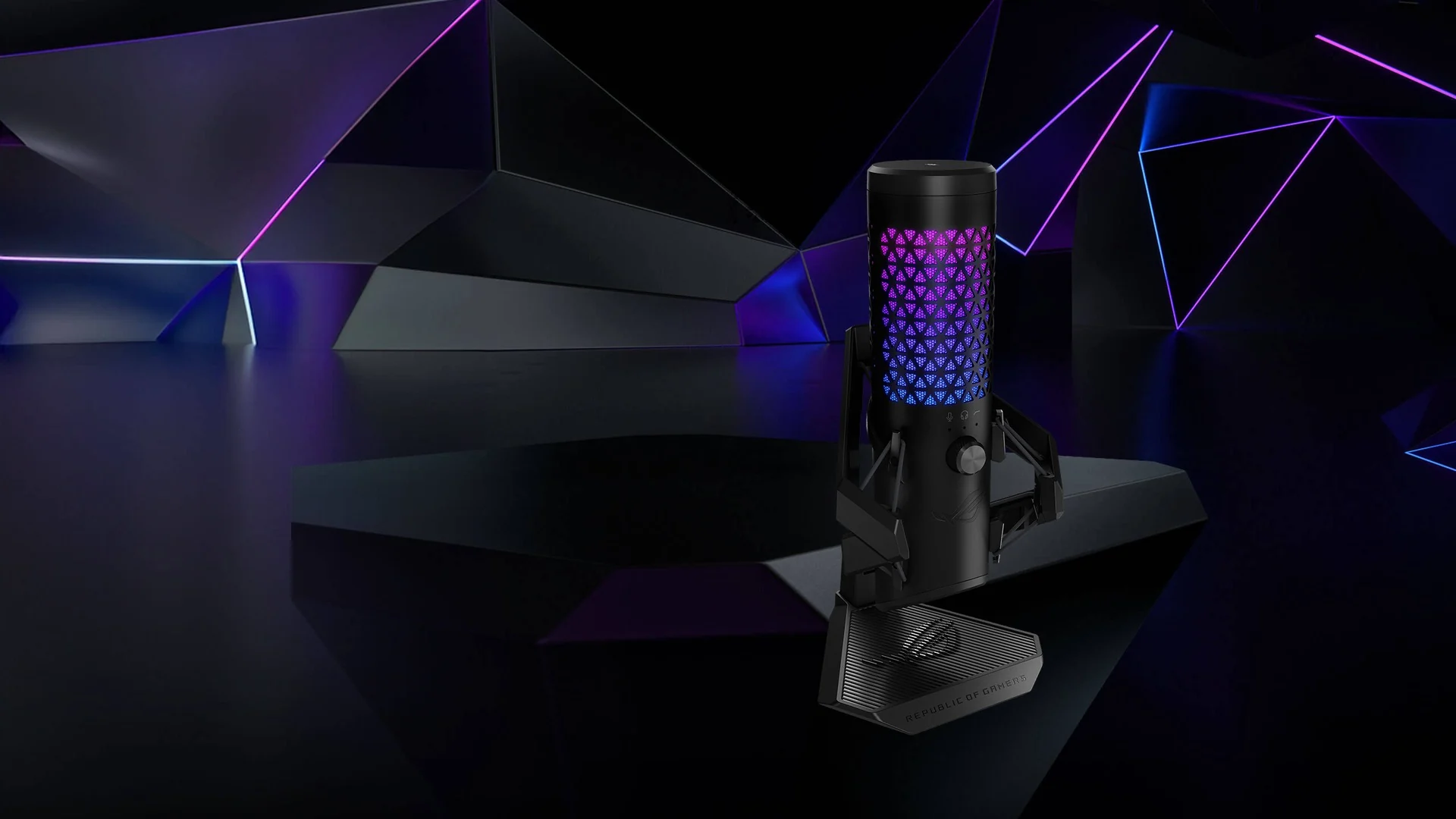Micrófono ROG Carnyx negro con iluminación RGB sobre un escenario oscuro