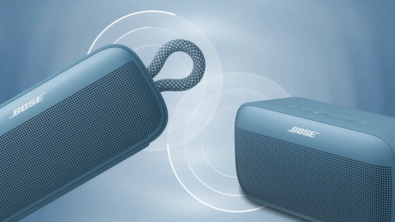 Dos Bose SoundLink Plus azul atardecer enlazados