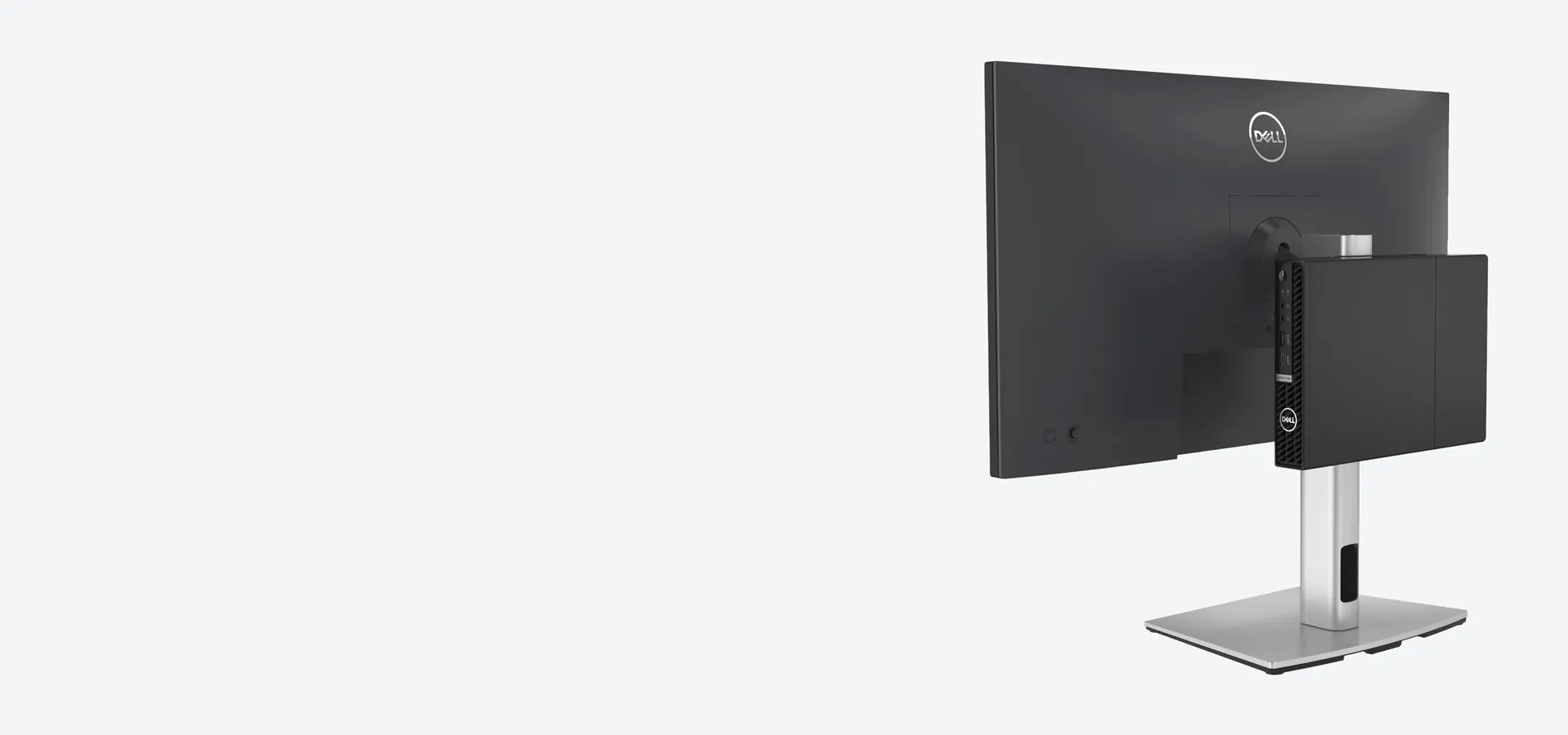 Soporte todo en uno Dell Pro Micro MFS22 con un monitor Dell y una PC Dell Micro montada detrás, vista trasera