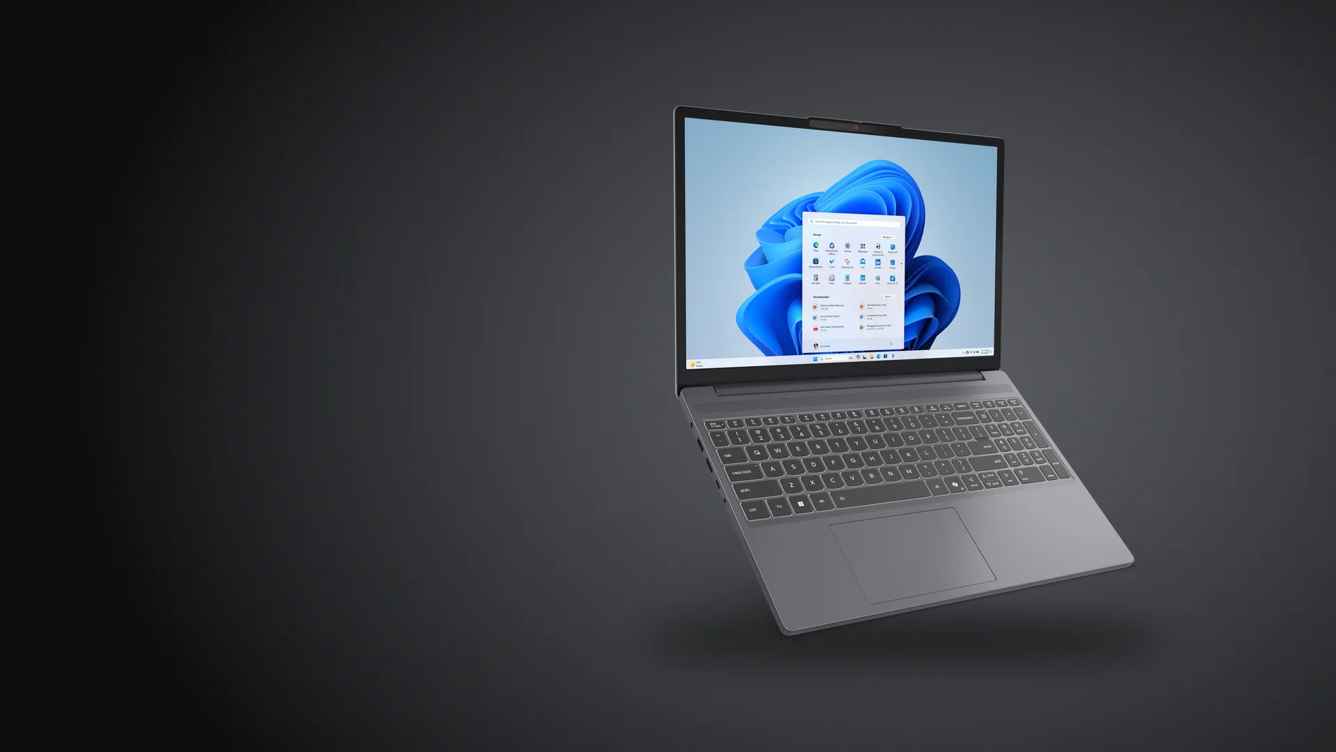 Notebook Lenovo IdeaPad Slim 3i Gen 10 color gris Luna Grey, abierta, sobre fondo grafito