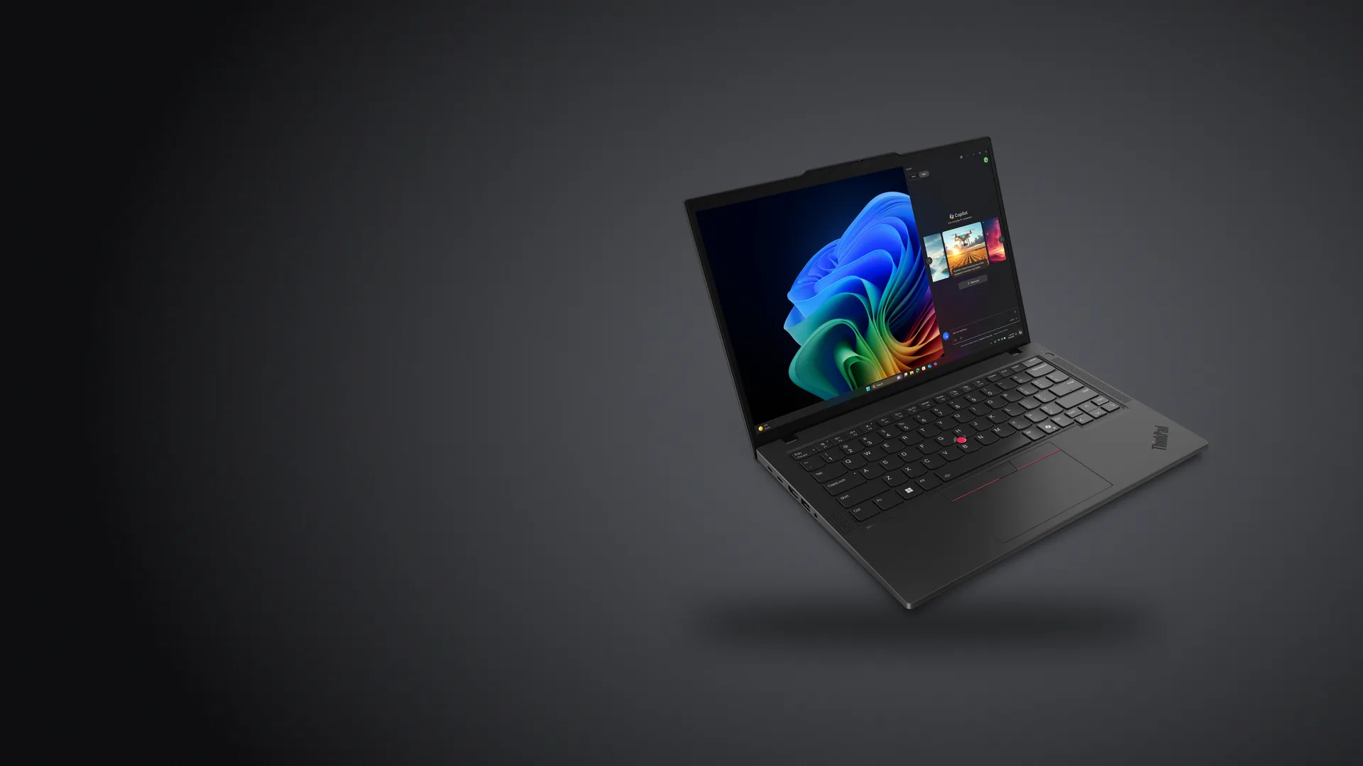 Notebook Lenovo ThinkPad T14 Gen 6 negra, abierta, sobre fondo grafito
