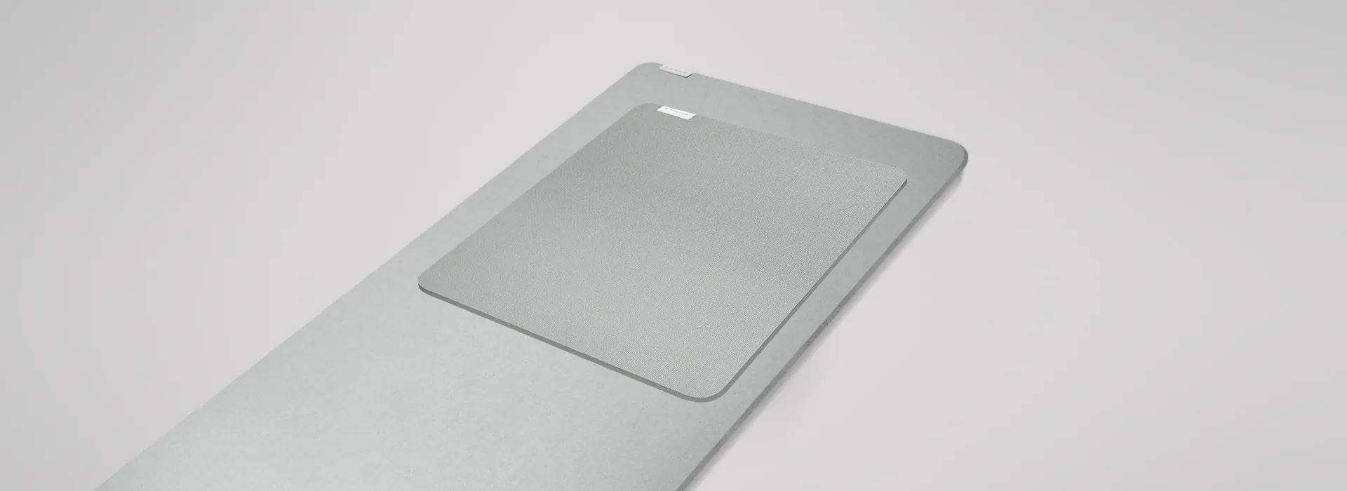Alfombrilla blanda Razer Pro Glide XXL gris sobre un fondo claro